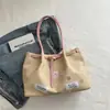Bolso de mujer de moda de verano 2026 nuevo versátil popular para mujer gran capacidad bolso de hombro bolso de mano para el trabajo bolso tote para el antebrazo