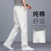 Pantalones casuales blancos finos sueltos de alta gama italianos para hombre, pantalones rectos elásticos de negocios para la primavera de 2026