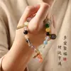Pulsera de Cuentas Multi-tesoro de Cristal para Mujer Dios de la Riqueza Nueva Cadena de Mano China Wenwan Estilo Nacional Retro Adorno de Mano Cacahuete Nicho Venta al por Mayor