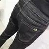 Jeans Ajustados Negros para Hombre 2026 Primavera Nuevos Versátiles Elásticos Corte Delgado Pantalones Cortos Pantalones Largos Elásticos Marca de Moda