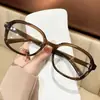 Nuevas Gafas de Estilo Coreano con Montura Ovalada, Retro, Sencillas, Casuales, Cara Lisa, Gafas Planas Pequeñas Anti-Luz Azul, Mismo Estilo para Hombres y Mujeres