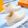 Botas de lluvia de suela gruesa para mujer, impermeables, antideslizantes y duraderas; botines de lluvia cortos de suela gruesa para hombre a la moda; zapatos de trabajo para cocina