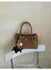 Bolso pequeño vintage para otoño e invierno para mujer 2026 nuevo bolso cruzado versátil de moda con un toque de alta gama para salir