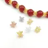 Accesorios para joyería DIY chapados en oro de alta retención de color, colgante de flor de loto hueco de doble cara, materiales para pulseras y collares de cuentas hechos a mano