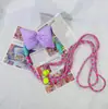 Clip trasero para teléfono móvil correa cruzada para niñas clip de cordón con lazo clip trasero japonés y coreano cordón transparente de dibujos animados para teléfono móvil