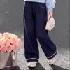 Colección nueva 2026: dulce y versátil top de manga larga con un lazo, combinado con pantalones vaqueros elegantes y modernos - un conjunto de dos piezas de moda para niñas
