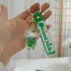 Llavero de Botella de Arena Líquida de Dibujos Animados, Pequeños Regalos para Puestos, Accesorios Acrílicos al por Mayor, Colgante Relleno de Aceite, Rasca Gatos Lindo de Regalo