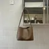 Bolsa tipo balde texturizada em trama retrô estilo coreano, nova coleção de verão 2026, design minimalista e único, adequada para o dia a dia, bolsa de ombro ou bolsa de axila