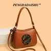 Bolso de mano nuevo transfronterizo, bolso de hombro vintage repujado, tela prensada estilo étnico, diseño texturizado, adecuado para mujeres de mediana edad y madres