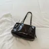 Bolsa vintage de gran capacidad, nuevo modelo principios de otoño 2026, bolso de hombro o axila casual texturizado, bolsa tote de alta apariencia para el día a día