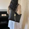 Bolsa feminina de grande capacidade 2026 novo modelo bolsa de ombro casual para trabalho com toque de luxo para aulas e deslocamento de estudantes universitários bolsa tote