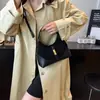 Bolso de mujer de alta gama, diseño de bloques de color, de nicho, modelo nuevo 2025, bolso de mano versátil para el día a día, bolso de moda tipo dumpling
