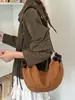 Bolso casual de gran capacidad para mujer, nuevo bolso tipo albóndiga de gamuza vintage otoño 2026, bolso de hombro y cruzado casual para el trabajo