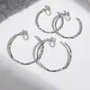 Brincos de argola de metal estilo francês, modernos e elegantes, com um design retorcido exagerado, argolas grandes, simples e sofisticados, clipes de orelha sem furo