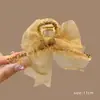 2025 Estilo Coreano Aleación Galvanizada Triángulo Geométrico Pinza de Tiburón Accesorio para el Cabello de Mujer Yiwu Fresco y Dulce Accesorio para la Cabeza