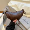 Bolso de Mano de Cuerno de Vaca de Alta Gama para Mujer 2026 Nuevo Estilo Sentido de Diseño de Nicho Billetera para Monedas Bolso de Hombro Cruzado Lujo Ligero