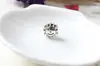 Huiyue sartén hogar personalidad creativa DIY Flor de Océano cara sonriente cuenta de agujero grande pulsera hilo decoración Yiwu fabricantes mayorista