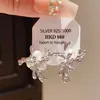 Pendientes de Flor de Perla Artificial Estilo Metal Retro Francés Aguja de Plata Pendientes de Moda Ins Elegantes de Nicho Estilo Europeo y Americano