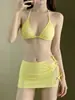Bikini de dos piezas con estampado de leopardo 2026 para mujer, traje de baño triangular con cuello halter, falda corta sexy de amarre, trajes de baño europeos y americanos