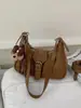 Bolso de axila para mujer, nueva colección otoño 2026, moderno, retro, con un toque de alta gama, adecuado para el uso diario y para ir al trabajo, versátil bolso de hombro o bolso cruzado