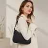 Bolso bandolera versátil de alta gama al por mayor transfronterizo para mujer, nuevo bolso de hombro de moda para damas francesas 2026, bolso de axila
