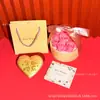 Oro Puro 999 Creativo 520 Qixi Exquisita Moneda de Oro en Forma de Corazón Set de Regalo Decoración del Día de San Valentín Personalizado Venta al por Mayor