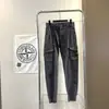 Calça de Trabalho Cross-Border Cor Sólida Pedra Estilo Novo Primavera e Outono Patch de Bússola Cintura Elástica Bolso Calça Jogger Casual