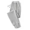 Calça casual masculina 2024 outono e inverno nova forrada com fleece espessa estilo coreano bolso na ponta do pé zíper calça plus size geração