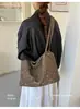 Bolso de mujer estilo casual, nuevo modelo de otoño 2026, bolso de hombro con estampado de leopardo, de nicho y súper popular, bolsa tote de gran capacidad para el día a día