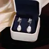 Pendientes de botón de perla barroca de plata de ley S925 transfronterizos, pendientes irregulares plisados en forma de gota, color plateado