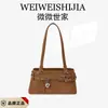 Bolsa de Axila Nicho Estilo Coreano High-End Feminina Outono/Inverno Nova Versátil Bolsa Baguete de Mão Bolsa de Ombro Único Transversal para o Trabalho