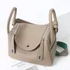 Capa Superior Piel de Vaca Togo Lindy Bolso de Piel Genuina para Mujer 2025 Nuevo Retro Europeo y Americano Bolso Cubo Moda Mano Bolso de Piel Genuina para Mujer