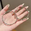 Aretes de perlas para mujer, suministro de puesto de mercado nocturno, aretes de temperamento de alto sentido, diseño de nicho, aretes de moda, venta al por mayor