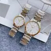 Transmisión en vivo de Tiktok reloj de pareja de acero al cuarzo con banda de berenjena europea tendencia de moda para parejas