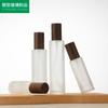 Botella de prensa de vidrio esmerilado con veta de madera negra botella rociadora de vidrio esmerilado tapa con veta de madera negra 30ml