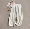 Calça pantalona na cor cáqui com barra curva, apresentando zíper e corte reto, para mulheres, nova coleção outono 2026, projetada para baixinhas, cintura alta, modelagem solta e casual.