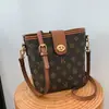 Bolso Cubo Vintage Floral de Alta Gama Transfronterizo para Mujer 2026 Nuevo Bolso de Hombro para Mujer con Estampado Retro Bolso Cruzado Versátil