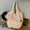 Nova bolsa de compras de ombro único, grande capacidade, moderna, simples, vintage, casual, tricotada vazada, bolsa de palha tecida