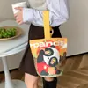 Venta al por mayor del fabricante Bolso de mano artístico de moda Bolso de lona Bolso tipo cubo de gran capacidad para mujer 2026 Nuevo Bolso para almuerzo de trabajo