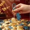 Venta Caliente Año del Cordero Tener Dinero para Gastar Llavero Dorado Oro Puro 999 Correa para Teléfono Colgante de Bolso Empaque de Caja de Regalo Regalo para Conducir