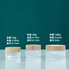 Tapa de grano de madera simple botella de crema de vidrio esmerilado 30g botella para máscara de contorno de ojos con tapa interior botella cosmética muestra sub-empaque