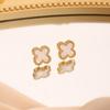 Aretes de acero de titanio de trébol de cuatro hojas para mujer, temperamento de moda, diseño de nicho, aretes con sentido de alta gama, aretes de moda nuevos 2024