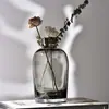 Jarrón minimalista de estilo europeo, recipiente creativo de vidrio estilo INS para sala de estar y mesa de comedor, jarrón de boca pequeña para arreglos florales en casa, artesanía decorativa