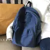 Mochila escolar de lona retrô para estudantes estilo ins feminina mochila versátil para estudantes do ensino médio feminino cor sólida simples mochila de campus masculina