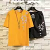 Conjunto Esportivo Casual Masculino de Verão Camiseta de Manga Curta Shorts Conjunto de Duas Peças Solto Respirável Estilo Chinês Par Conjunto Completo