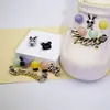 Zuecos de Color Gelatina con Accesorios Florales, Cadena Dorada, Parte Superior Desmontable de Moño, Hebilla Decorativa Dopamina