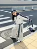 Conjunto de Primavera y Otoño para Niñas 2026 Nueva Moda Callejera Fresco Elegante Sudadera y Pantalones Anchos Conjunto de Dos Piezas Otoño