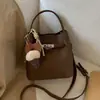Bolso bandolera de mujer moderno y versátil, bolso de mano con un toque de alta gama, bolso cubo de diseño nicho, bolso cesta, transfronterizo