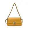 Bolsa Quadrada Pequena Exquisita e Elegante para Mulheres 2026 Nova Bolsa de Ombro Cor Sólida Retrô Alta Qualidade Simples Casual Bolsa Transversal