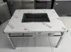 Mesa de BBQ Comercial sin Humo Parrilla de BBQ de Autoservicio Pierna de Cordero Asada a la Brasa Mesa de BBQ para Exteriores de Acero Inoxidable
